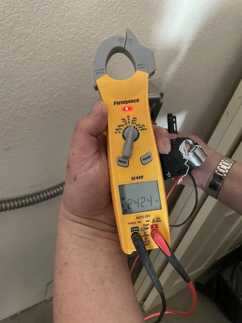 Voltage testing with clamp meter during Generator Installation in Fuquay